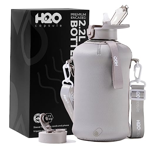 H2O Capsule 2.2L Half Gallon Water Bottle with Storage Sleeve and Covered Straw Lid – BPA Free Large Reusable Drink Container with Handle - Big Sports Jug, 2.2 Liter (74 Ounce) Leopard Print
