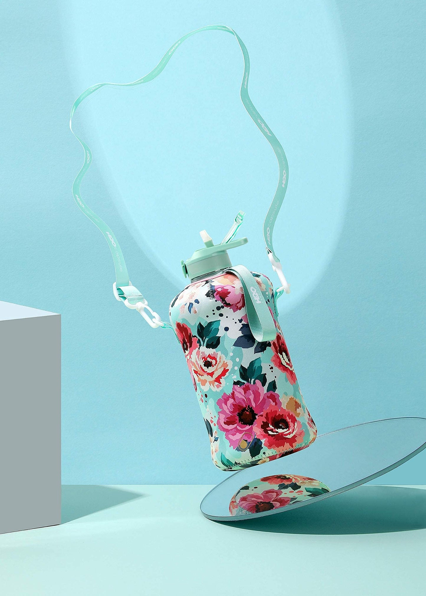 H2O Capsule 2.2L Half Gallon Water Bottle with Storage Sleeve and Covered Straw Lid – BPA Free Large Reusable Drink Container with Handle - Big Sports Jug, 2.2 Liter (74 Ounce) Floral Bloom